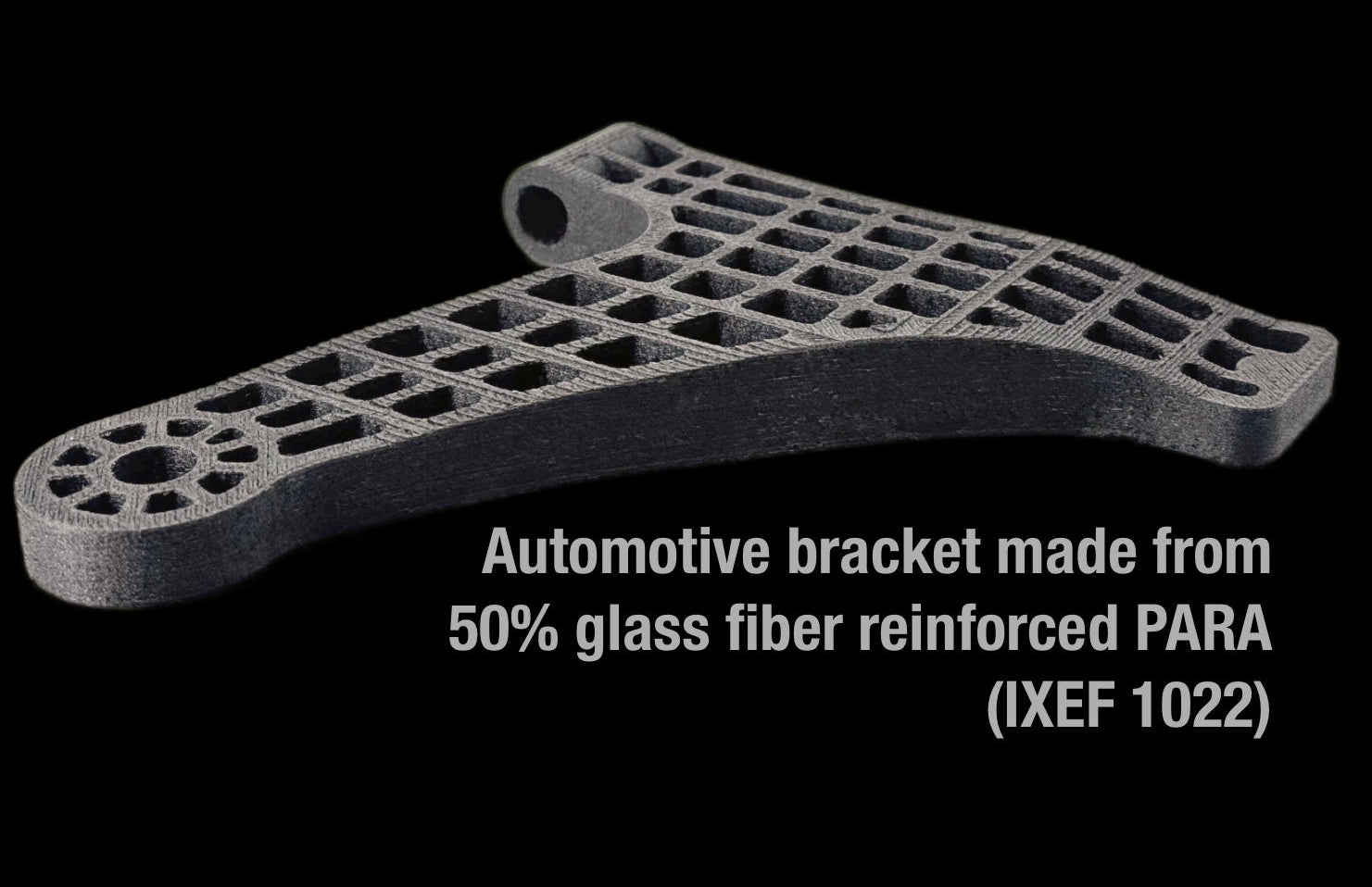 Automotive bracket made from glass fiber reinforced PARA on a black background